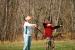 Chase McGuire aims carefully while Jillian Gustafson notches an arrow